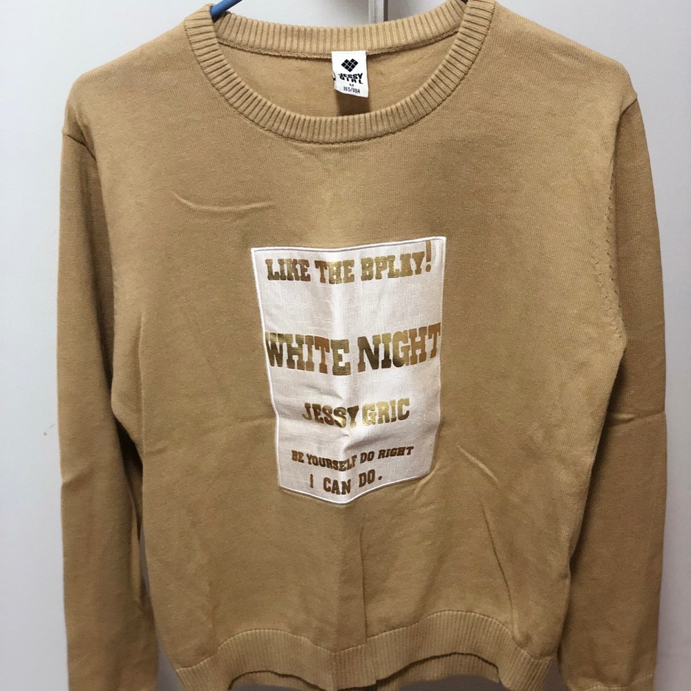 Brown sweater with lettering